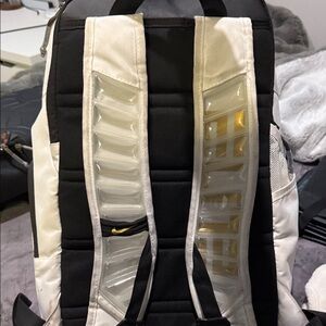 Nike Black and White Backpack with Gold Accents